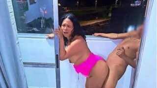 Latina Hot babe fucking and sucking cock on a balcony overlooking street